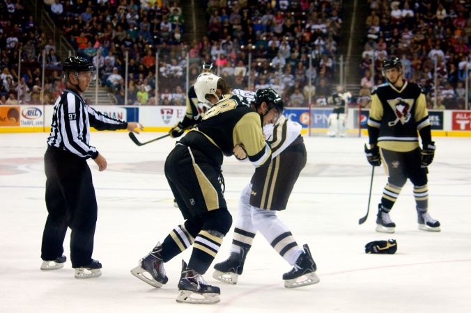 Tyson Strachan of the Hershey Bears fights with a Wilkes-Barre/Scranton Penguins player in Hershey, PA. (Annie Erling Gofus)